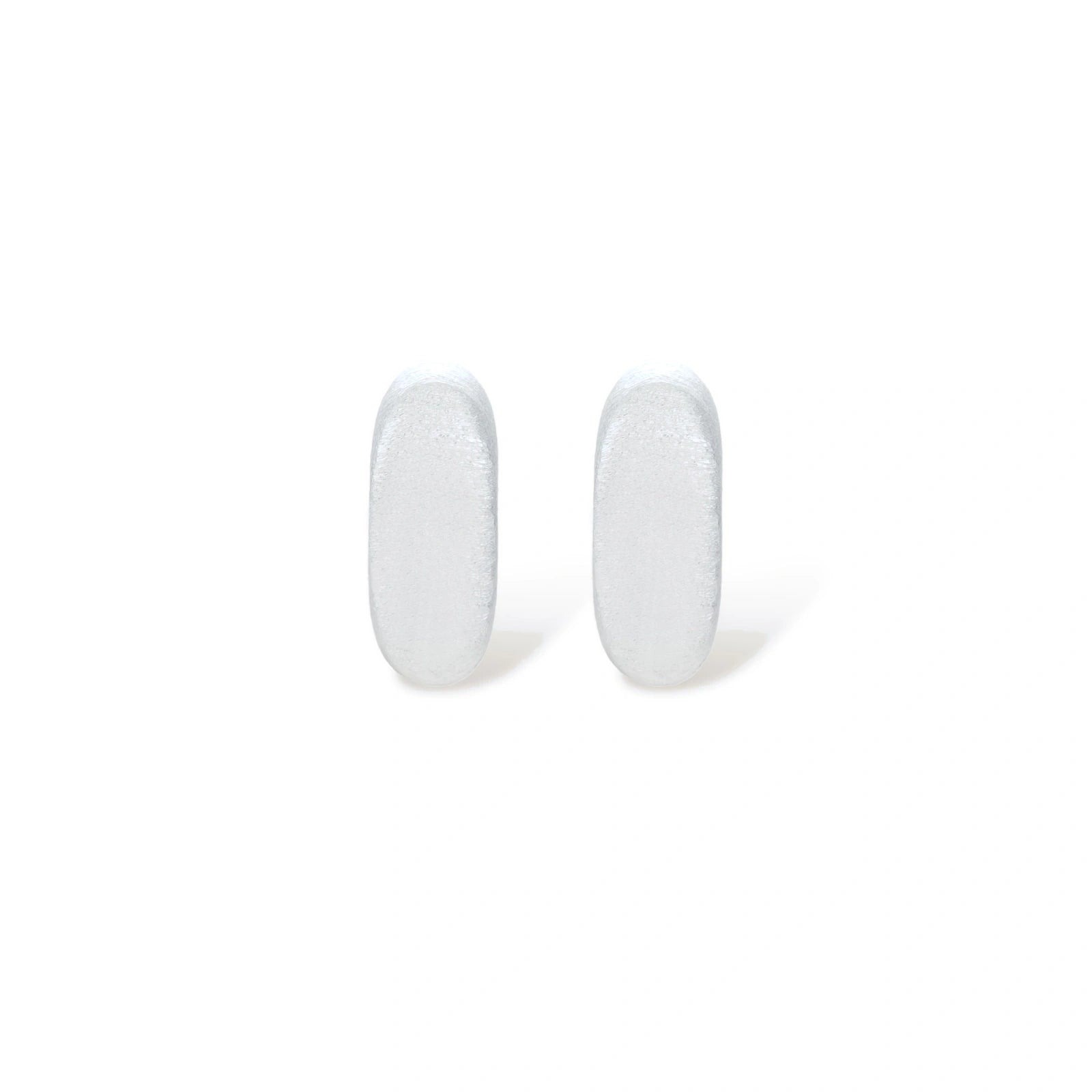 Pair of small silver-plated huggie hoop earrings with clean minimal design on neutral background.